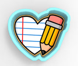 A heart-shaped cookie cutter with a pencil inside, representing the concept of learning or education.
