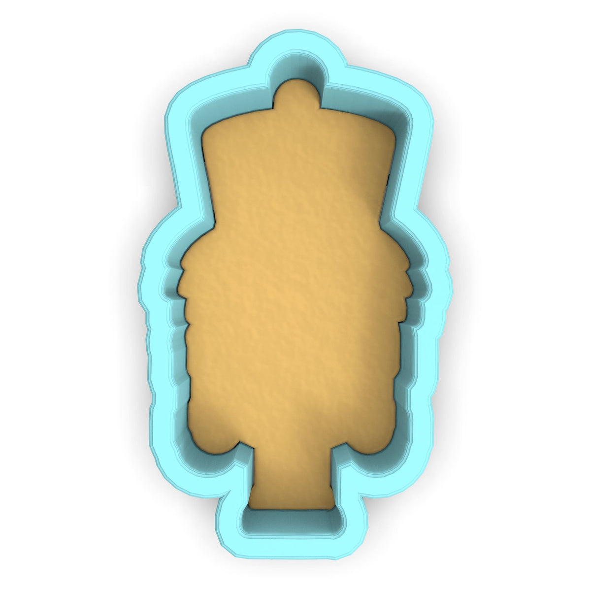 a cookie cutter with a cookie in the shape of a face
