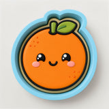 A round cookie cutter in the shape of an orange with a smiling face and a green leaf on top.