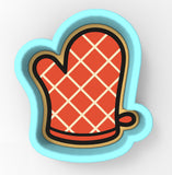 A red and white checkered pattern on a blue cookie cutter.