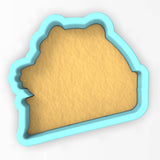 a cookie cutter shaped like the shape of a state