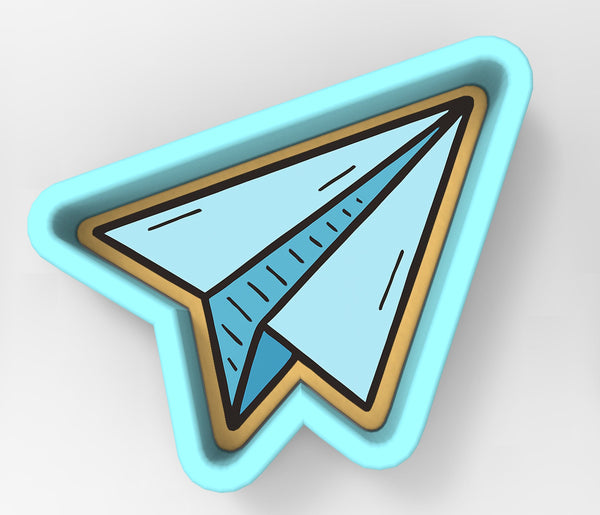 A blue and gold paper airplane cookie cutter.