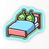 a sticker of a bed with two green vases on it