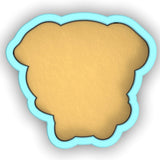 a cookie shaped like a bear on a white background