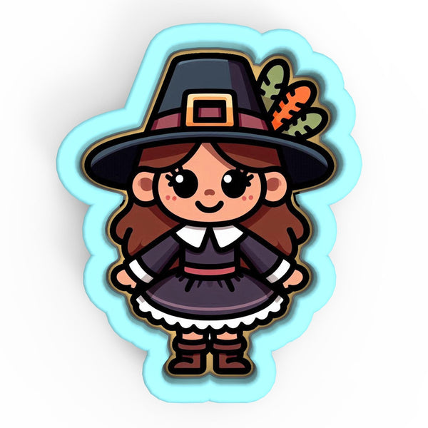 a cute little girl wearing a witches hat