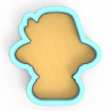 a cookie cutter shaped like a teddy bear