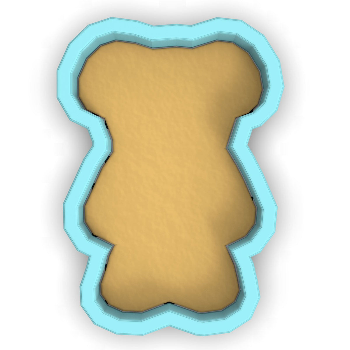 a cookie cutter with a cookie shaped like a man