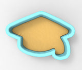 A 3D rendering of a graduation cap-shaped cookie cutter.