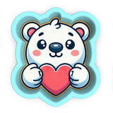 a white teddy bear holding a red heart