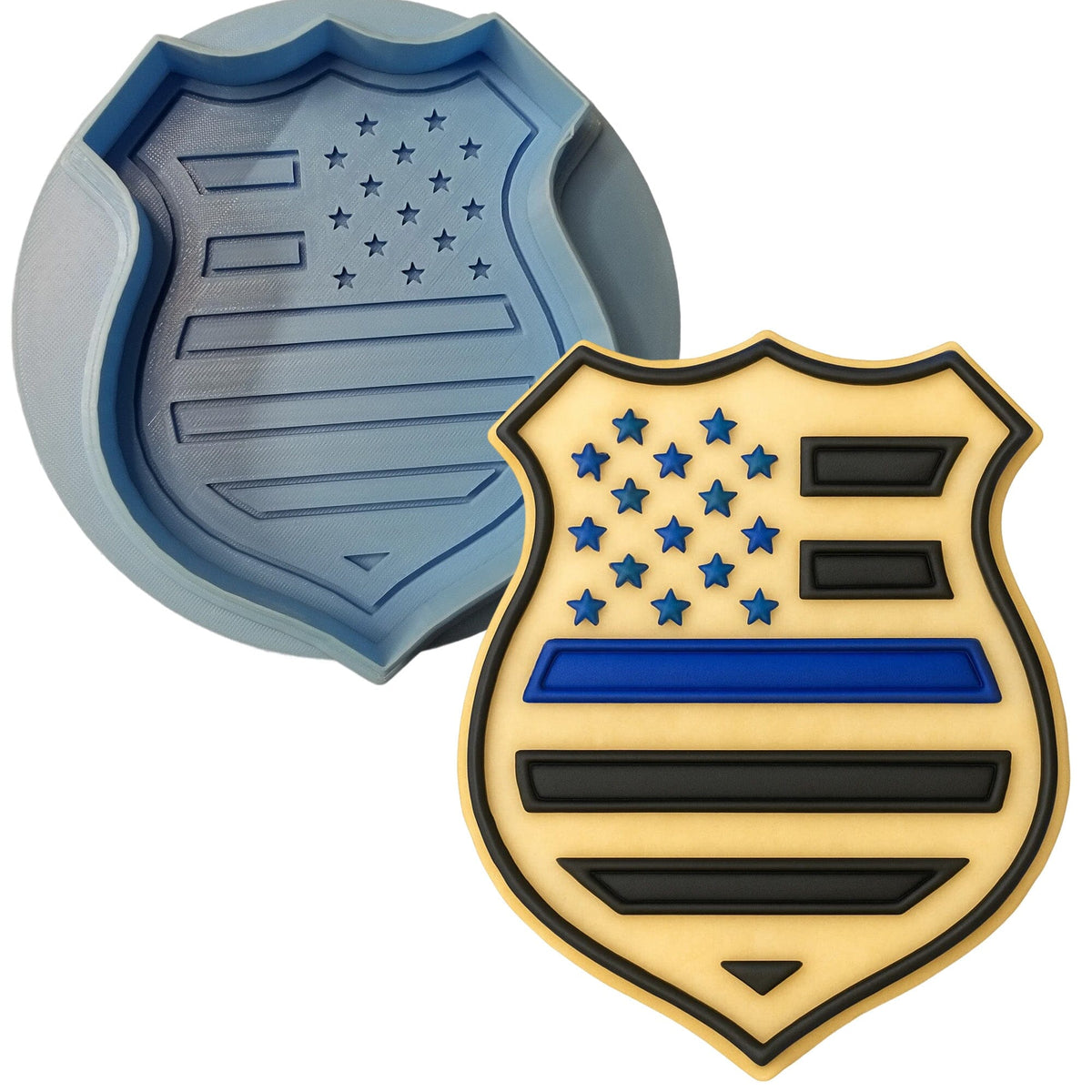 a cookie shaped like a shield and a police badge