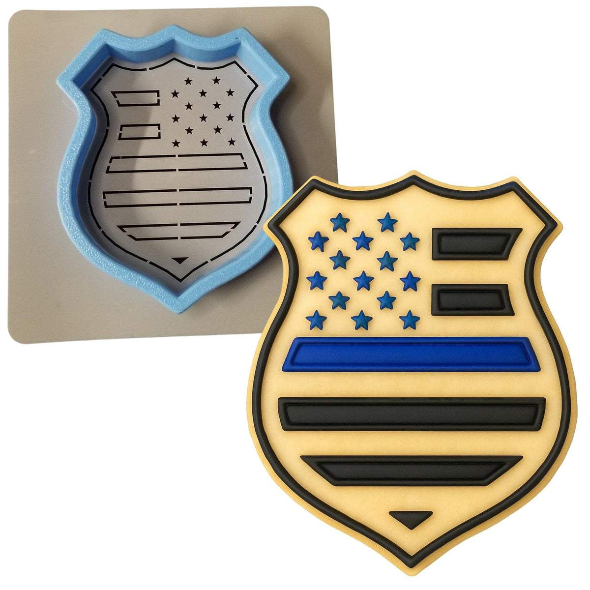 a cookie shaped like a police badge next to a cookie cutter