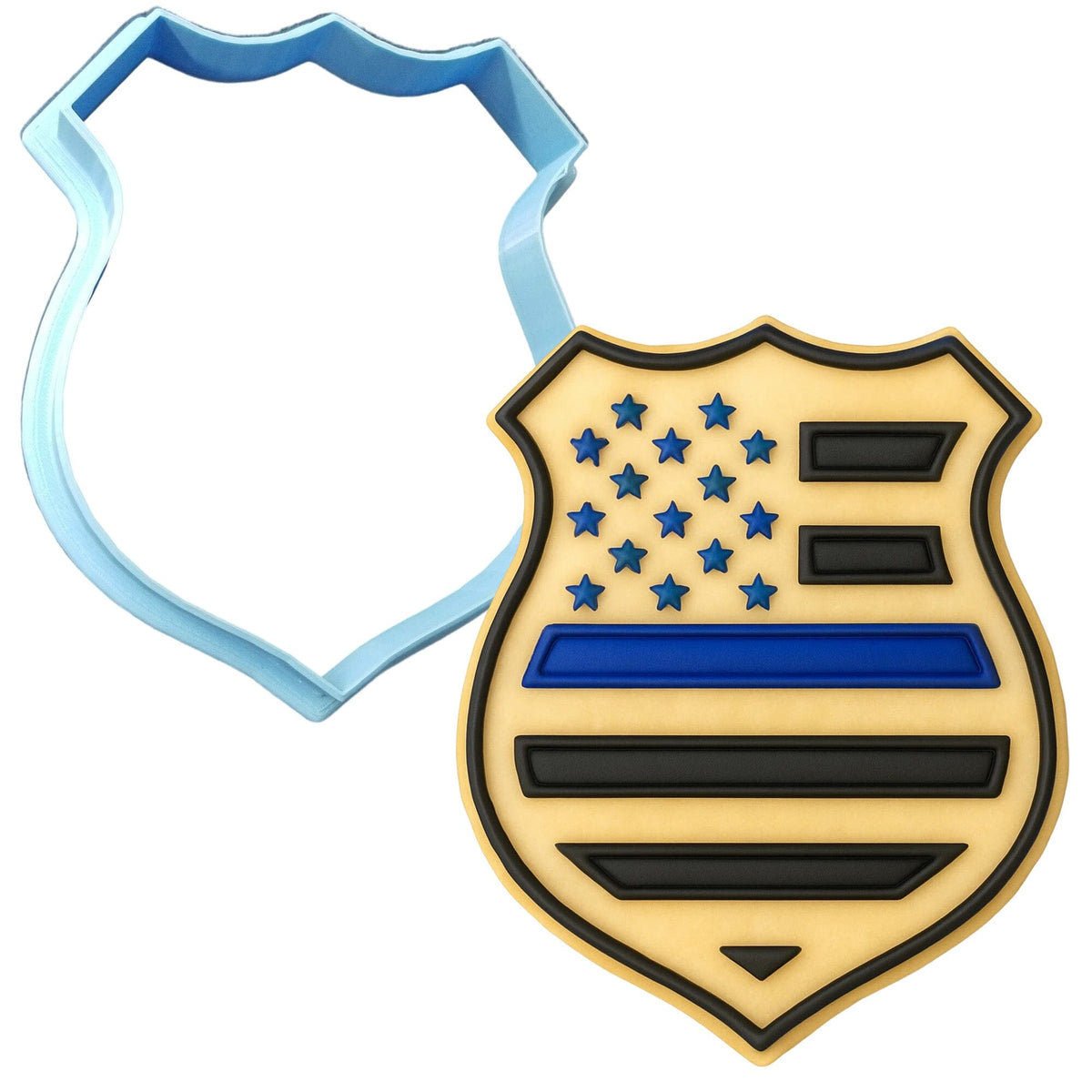 a cookie cutter shaped like a police badge