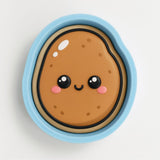 A blue bowl with a cartoon potato face on it.