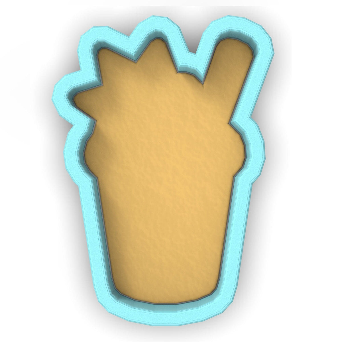 a cookie shaped like a cupcake on a white background