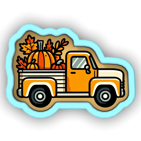 an orange truck with pumpkins in the back