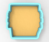 A blue-colored cookie cutter with a yellow-colored interior, designed for cutting out cookies or other shapes.