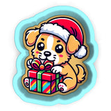 a dog wearing a santa hat and holding a gift box