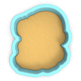 a cookie cutter with a cookie inside of it