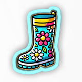 a picture of a boot with flowers on it