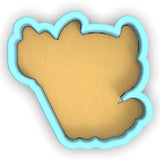 a cookie shaped like the shape of a bear