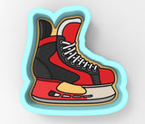 a picture of a skateboarder's shoe on a skateboard