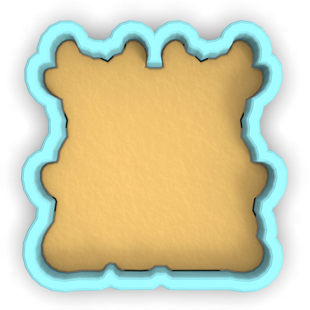 a cookie shaped like a bear with a blue frame