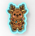 A cookie cutter in the shape of a reindeer, decorated with colorful Christmas lights.
