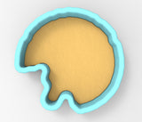 A blue-bordered cookie cutter with a yellow-colored interior, designed to cut out cookies.
