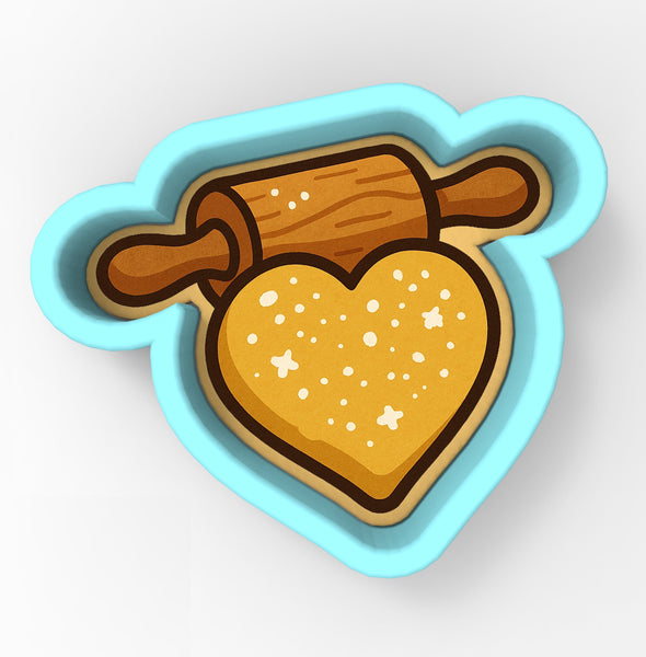 A heart-shaped cookie cutter with a rolling pin inside, creating a playful and whimsical design.