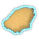 a cookie cutter with a cookie in the shape of a cookie