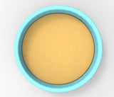 A blue bowl filled with a yellow substance, possibly a sauce or batter, is shown in the image.
