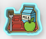 A lunch tray with a blue carton of milk, a red tray with a green apple, and a silver fork.