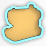 a cookie shaped like a piece of bread