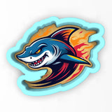 a sticker of a shark with flames on it