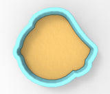 A blue cookie cutter with a yellow-colored interior, designed for cutting dough.