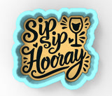 a sign that says sip hooray with a glass of wine