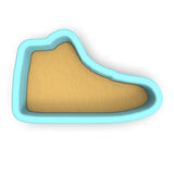 a cookie cutter shaped like a shoe