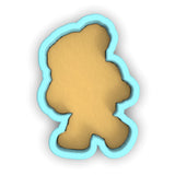 a cookie shaped like a teddy bear on a white background