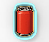 a can of soda in a blue frame