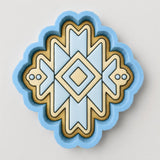 A blue and yellow geometric pattern with a diamond shape in the center.