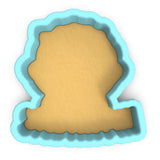 a cookie cutter shaped like the shape of a head