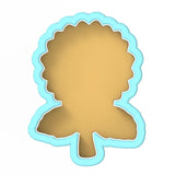 a cookie shaped like a leaf on a white background