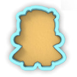 a cookie cutter shaped like a teddy bear