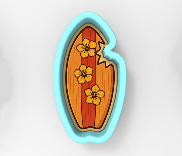 A blue-bordered cookie cutter shaped like a surfboard with yellow flowers on it.