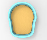 A blue bowl with a yellow substance inside it.