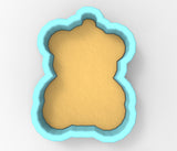 A 3D rendering of a teddy bear cookie cutter in a light blue color.