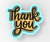 a thank you sticker on a white background