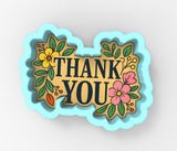 a picture of a thank you sign with flowers on it