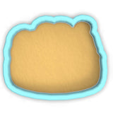 a cookie cutter with a cookie in the shape of a cookie