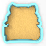 a cookie cutter shaped like a piece of bread